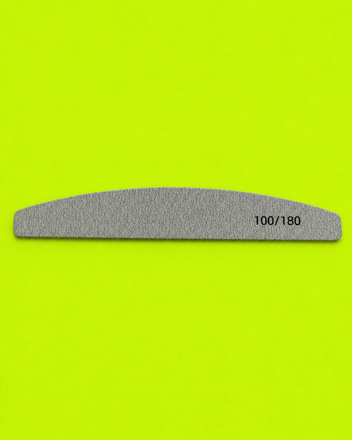 Smooth Shape nail file on neon green background